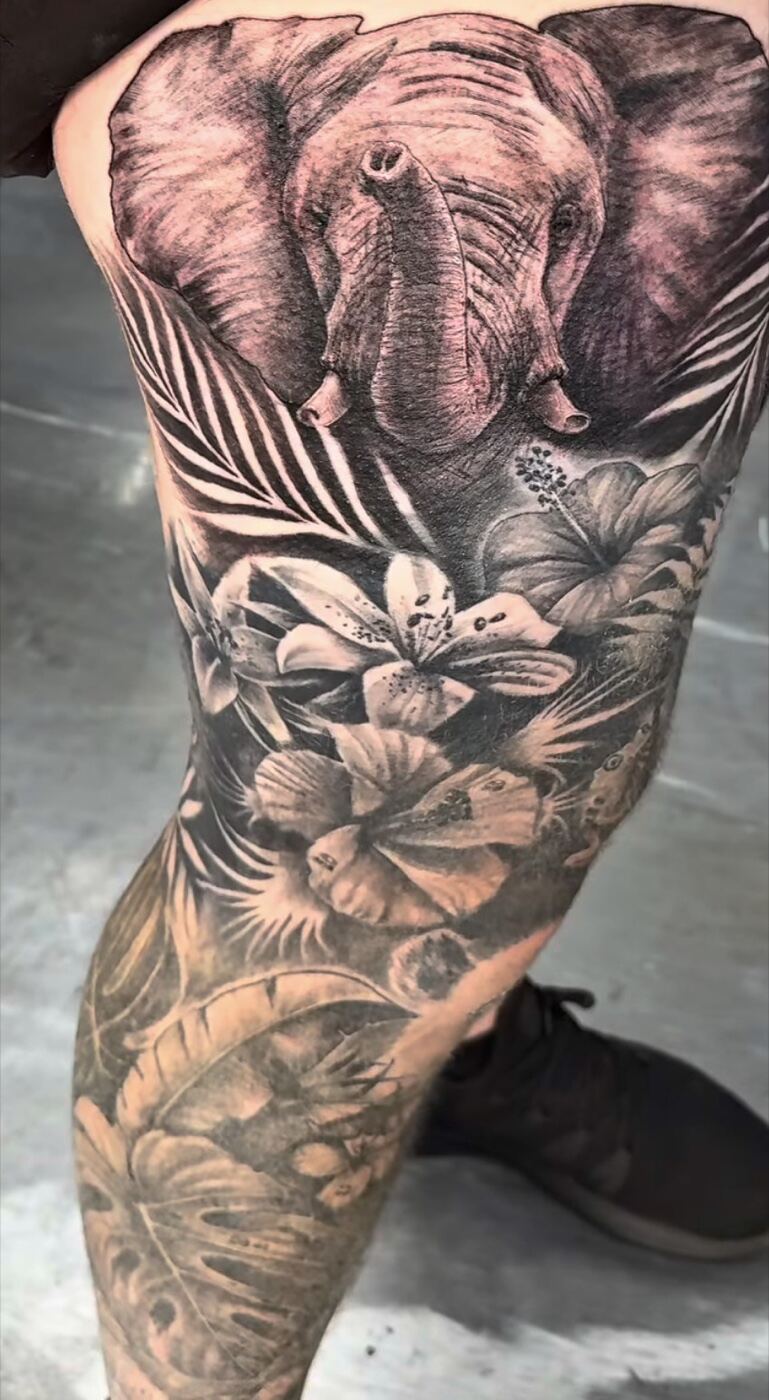 Black and grey illustrative leg piece, elephant with tropical florals
