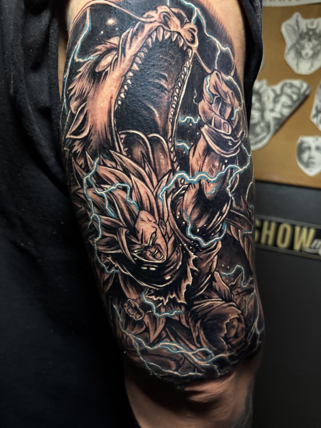 Black and grey neo traditional half sleeve, anime warrior with electric effects